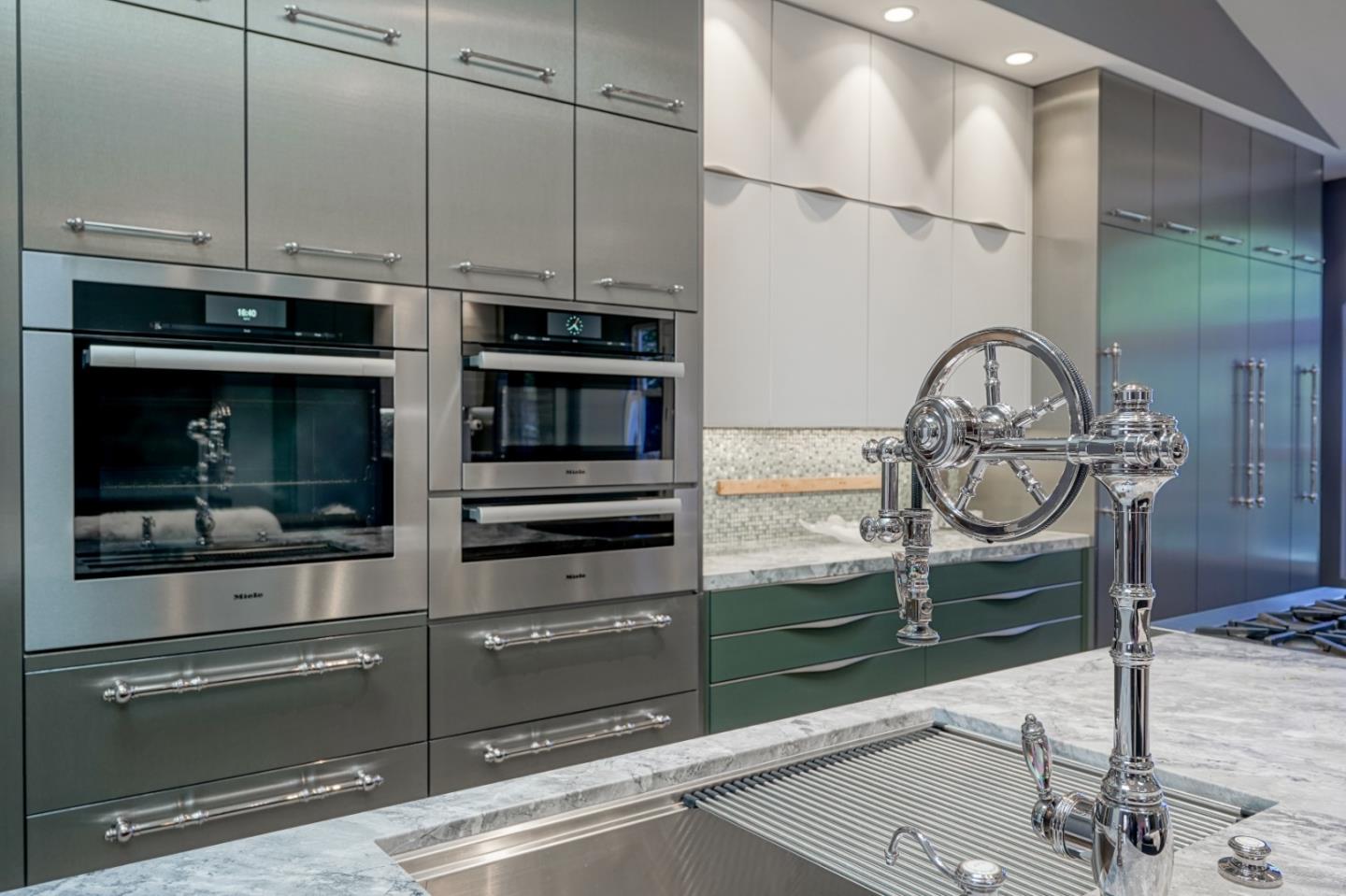 23715 Determine Lane Monterey, CA 93940 - Photo 9 of 43 a kitchen with a stove and a microwave