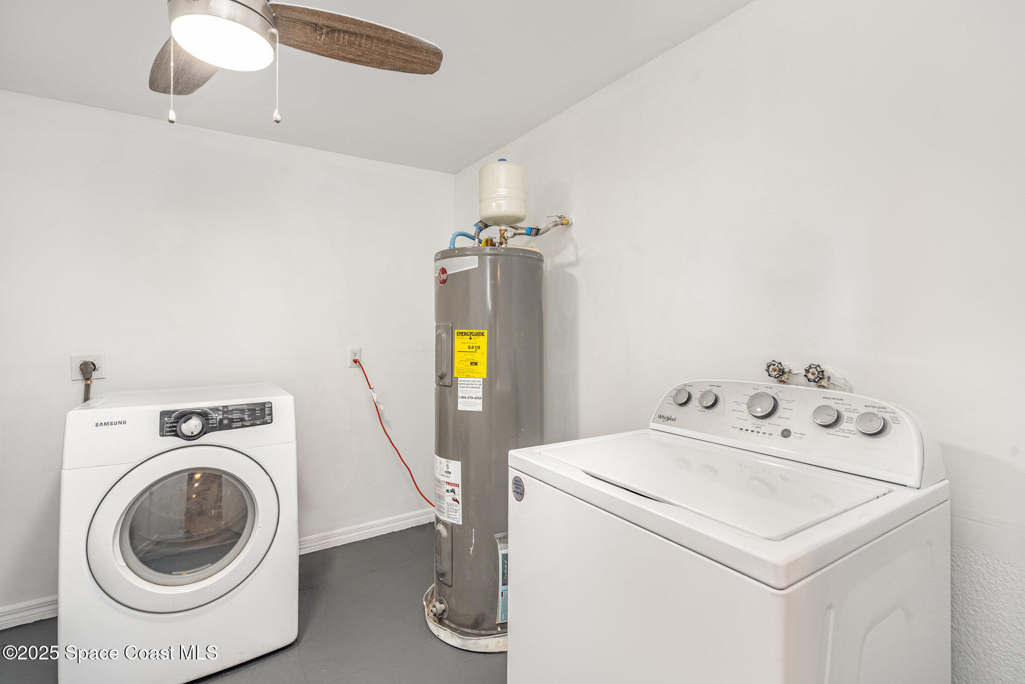 508 Comanche Avenue Melbourne, FL 32935 - Photo 20 of 21 a utility room with dryer and washer