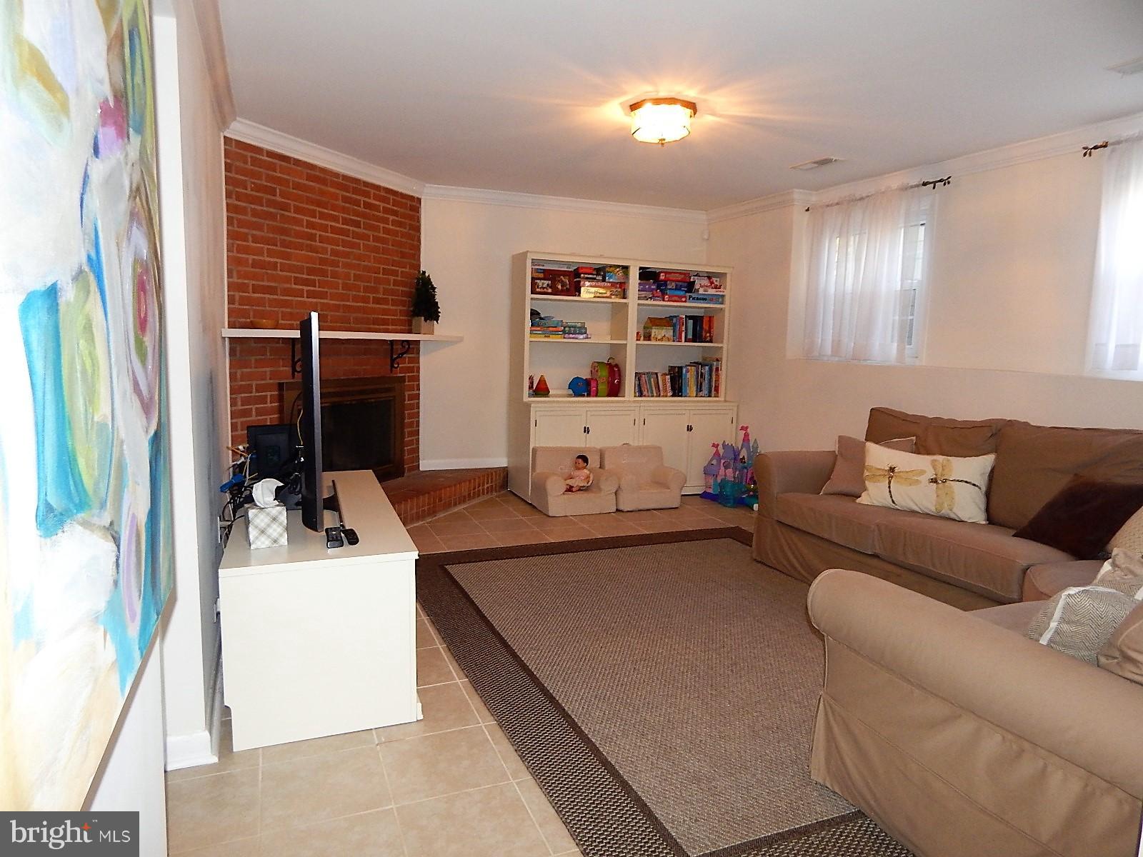 8703 Bradgate Road Alexandria, VA 22308 - Photo 15 of 23 Family Room with Tile Flooring