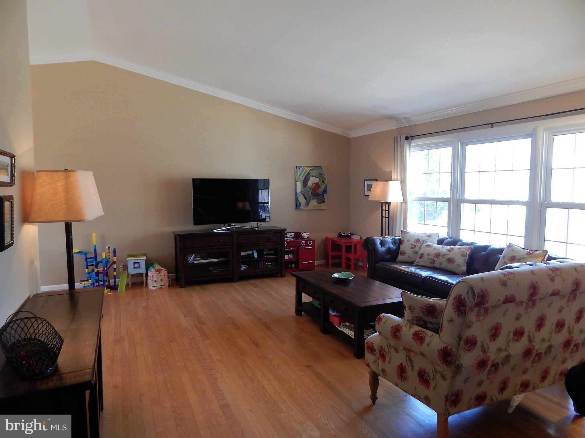 8703 Bradgate Road Alexandria, VA 22308 - Photo 2 of 23 Bright Living Room with Cathedral Ceilings