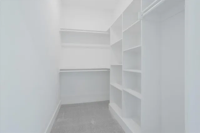 a view of an empty walk in closet
