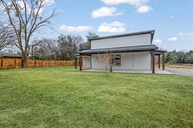 a front view of house with yard