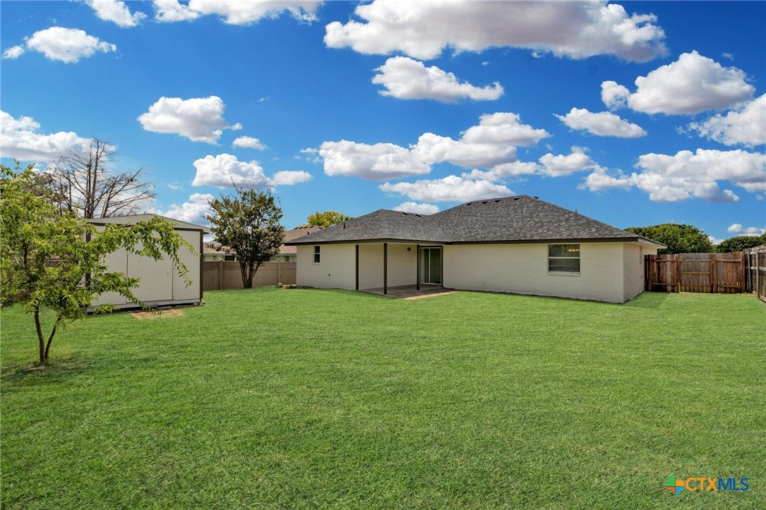 214 Timber Ridge Drive Nolanville, TX 76559 - Photo 27 of 31 a view of a house with a big yard
