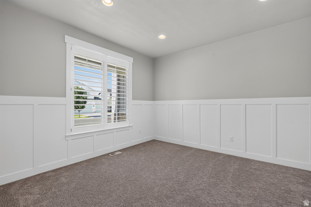 36 West Syracuse Road Vineyard, UT 84059 - Photo 8 of 56 Interior space featuring wainscoting, recessed lighting, and a window with plantation shutters