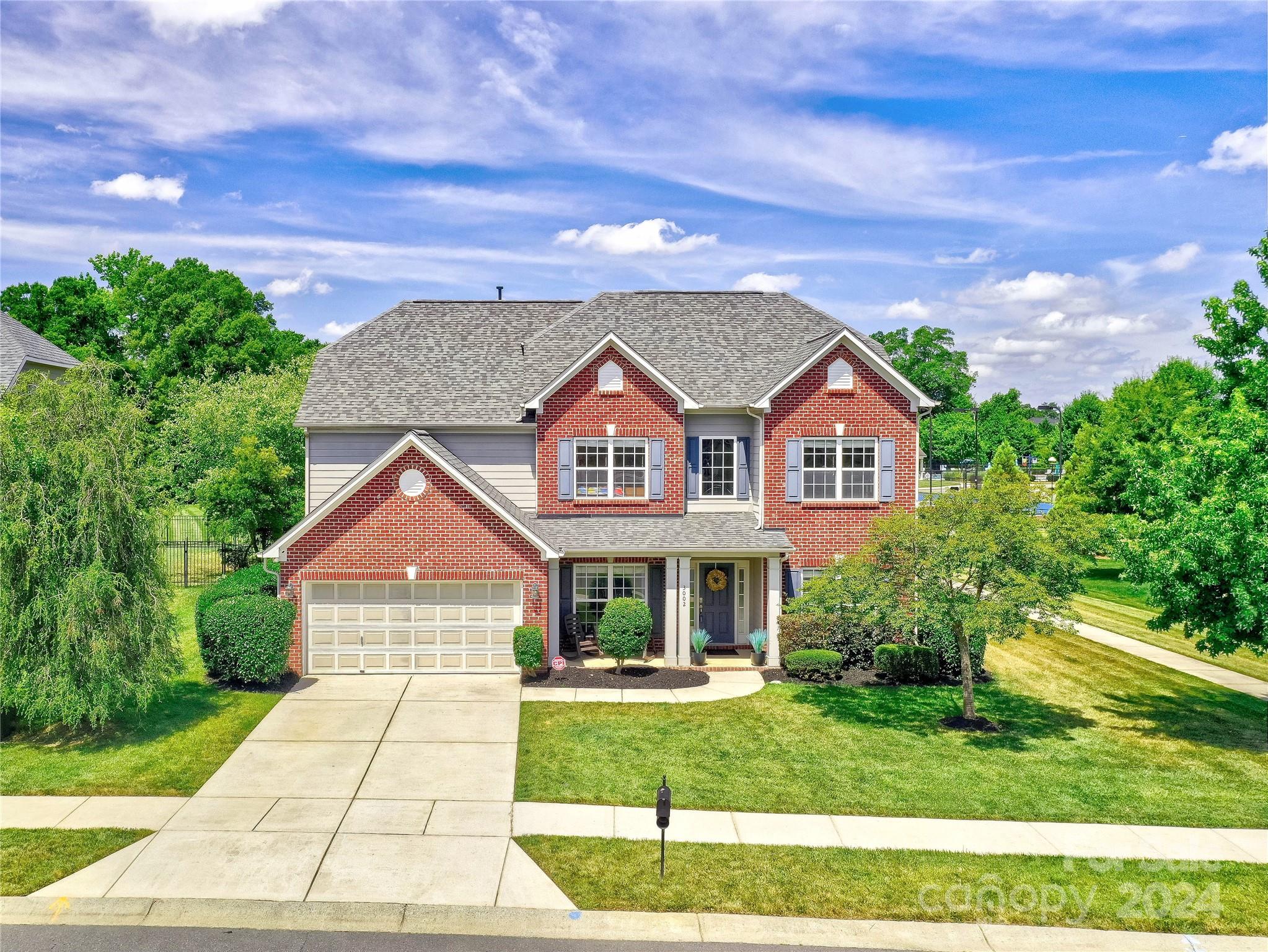 3002 Potomac Road Indian Trail, NC 28079 - Photo 1 of 48 a front view of a house with a yard