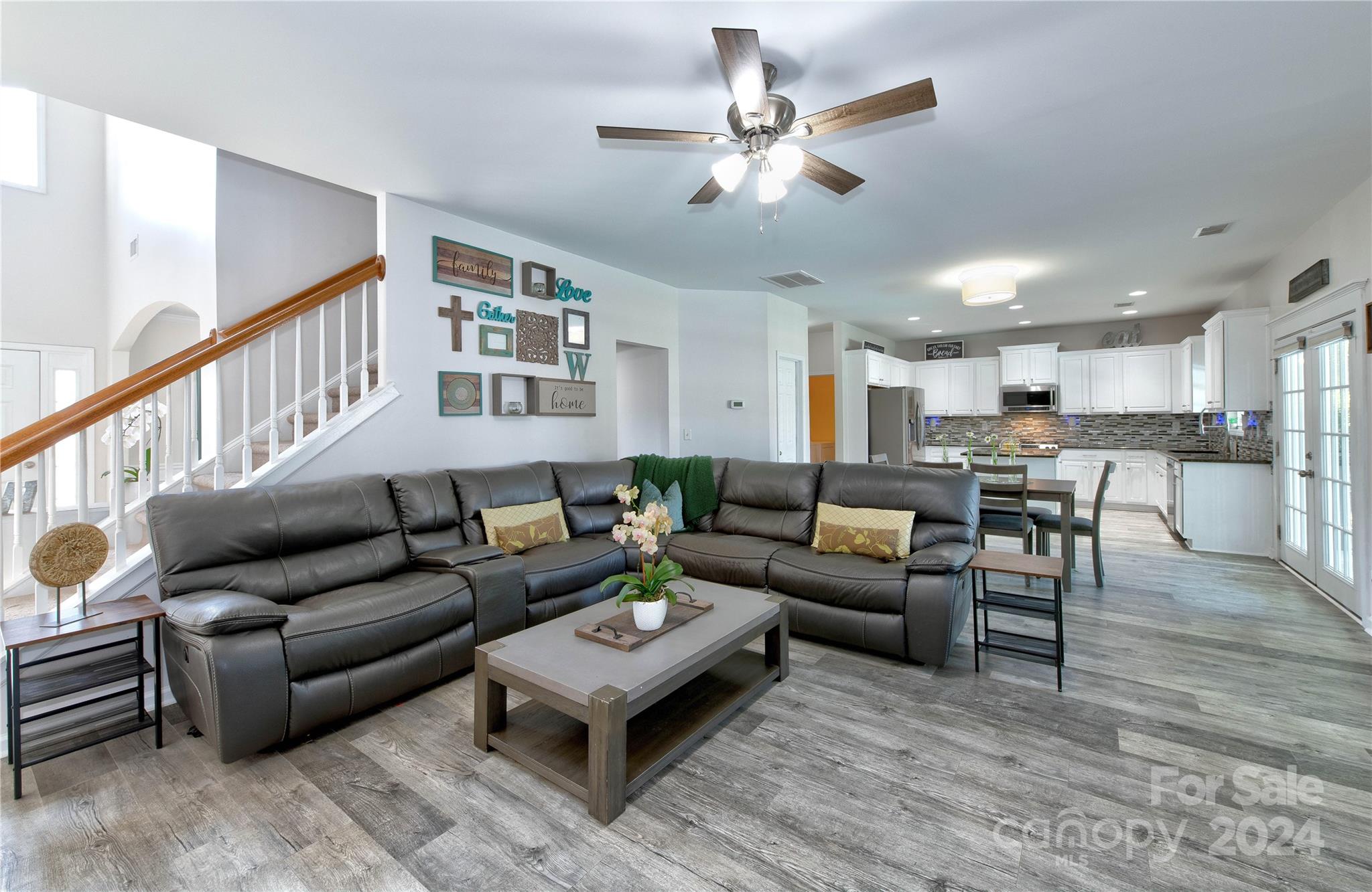 3002 Potomac Road Indian Trail, NC 28079 - Photo 17 of 48 a living room with furniture and a view of kitchen