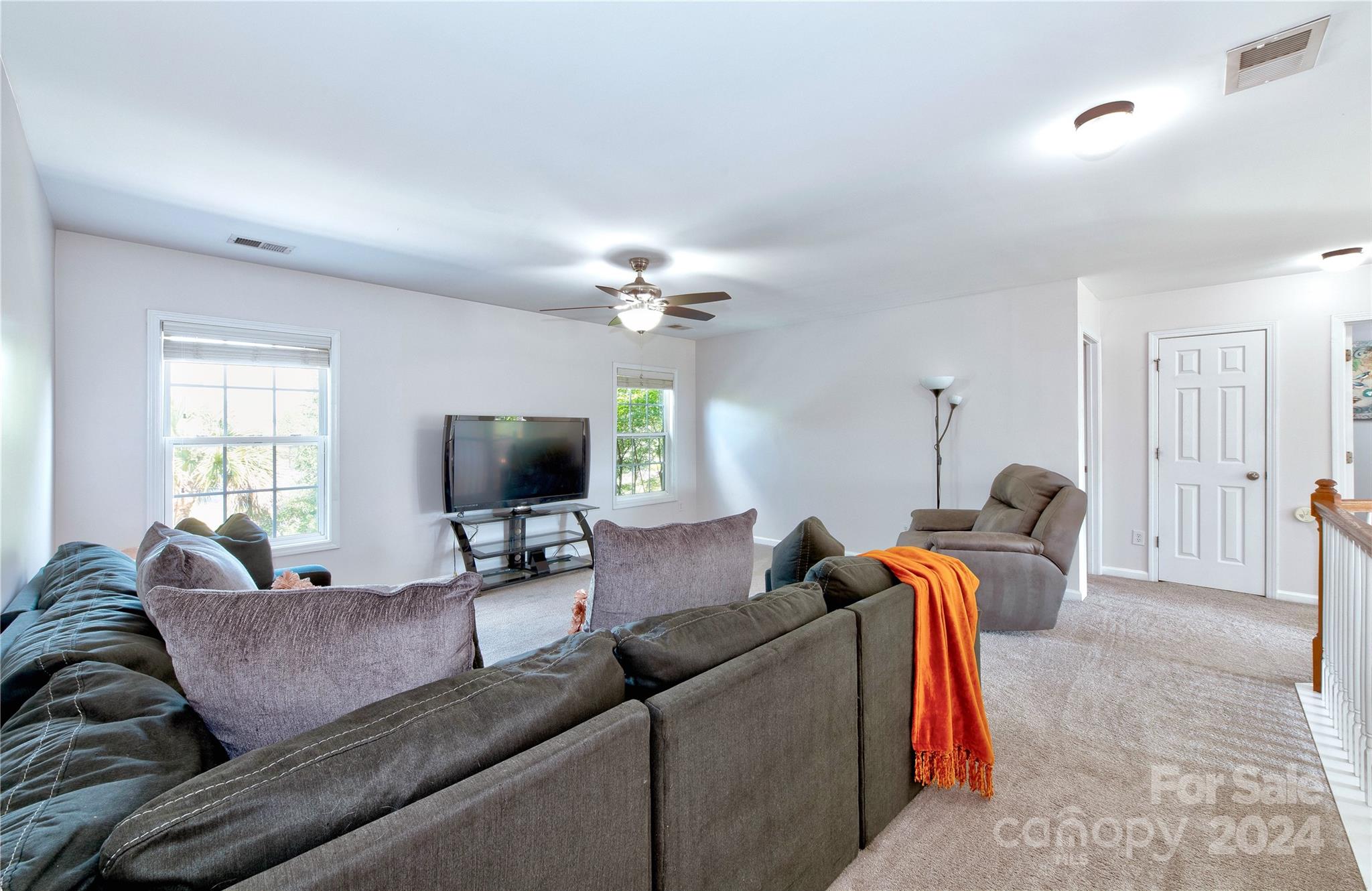 3002 Potomac Road Indian Trail, NC 28079 - Photo 22 of 48 a living room with furniture and a flat screen tv