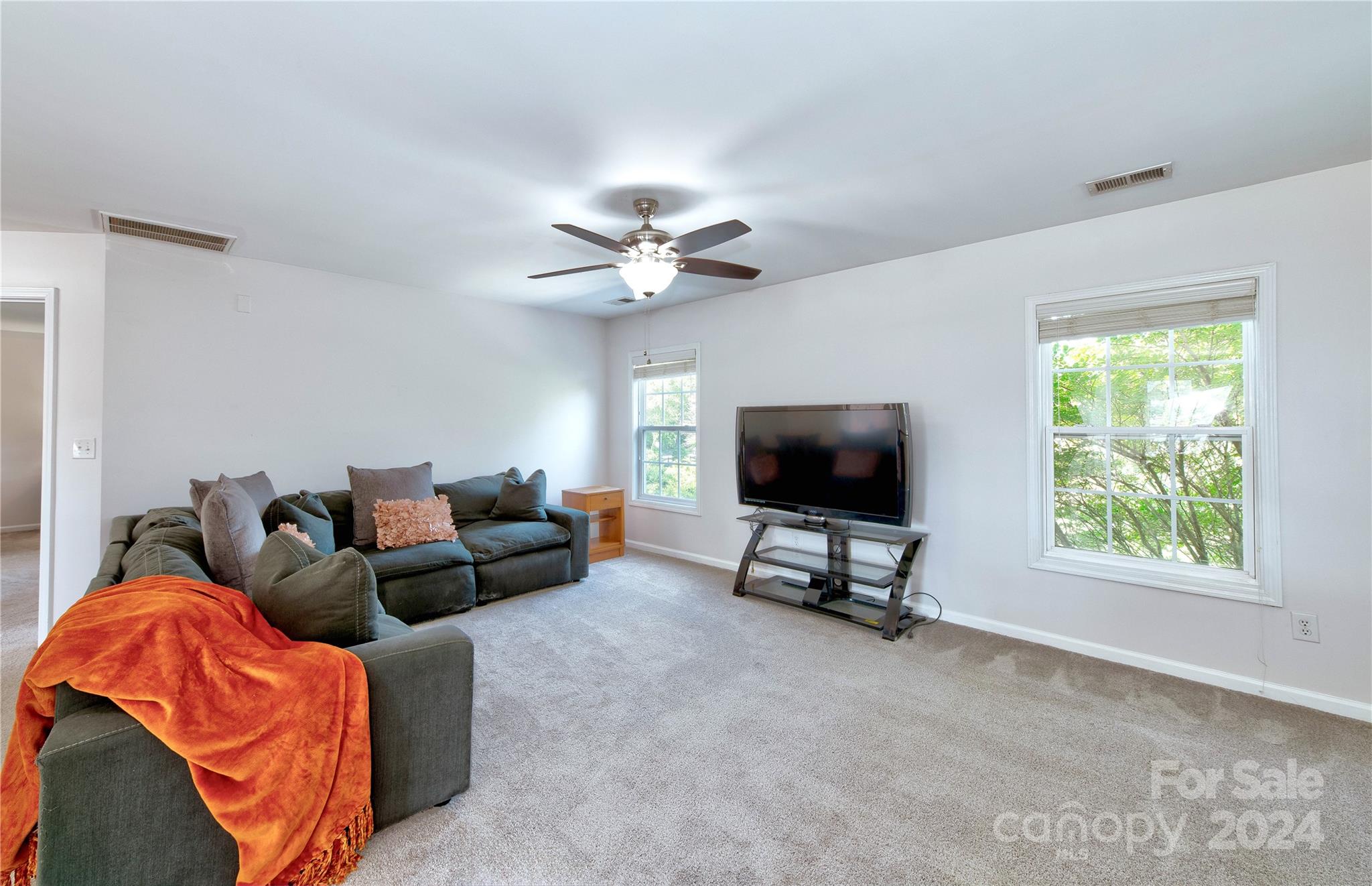 3002 Potomac Road Indian Trail, NC 28079 - Photo 23 of 48 a living room with furniture and a flat screen tv