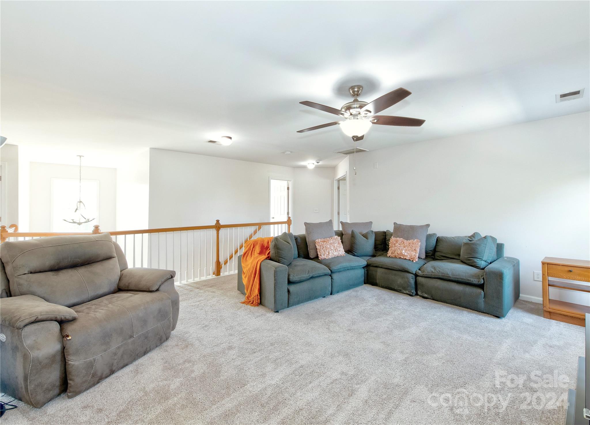 3002 Potomac Road Indian Trail, NC 28079 - Photo 24 of 48 a living room with furniture ceiling fan and a rug