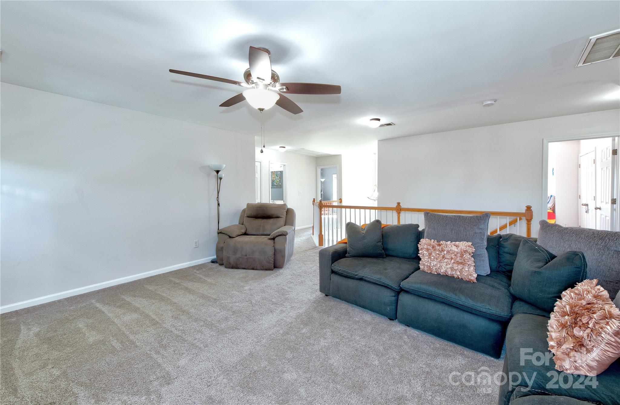 3002 Potomac Road Indian Trail, NC 28079 - Photo 25 of 48 a living room with furniture and a chandelier