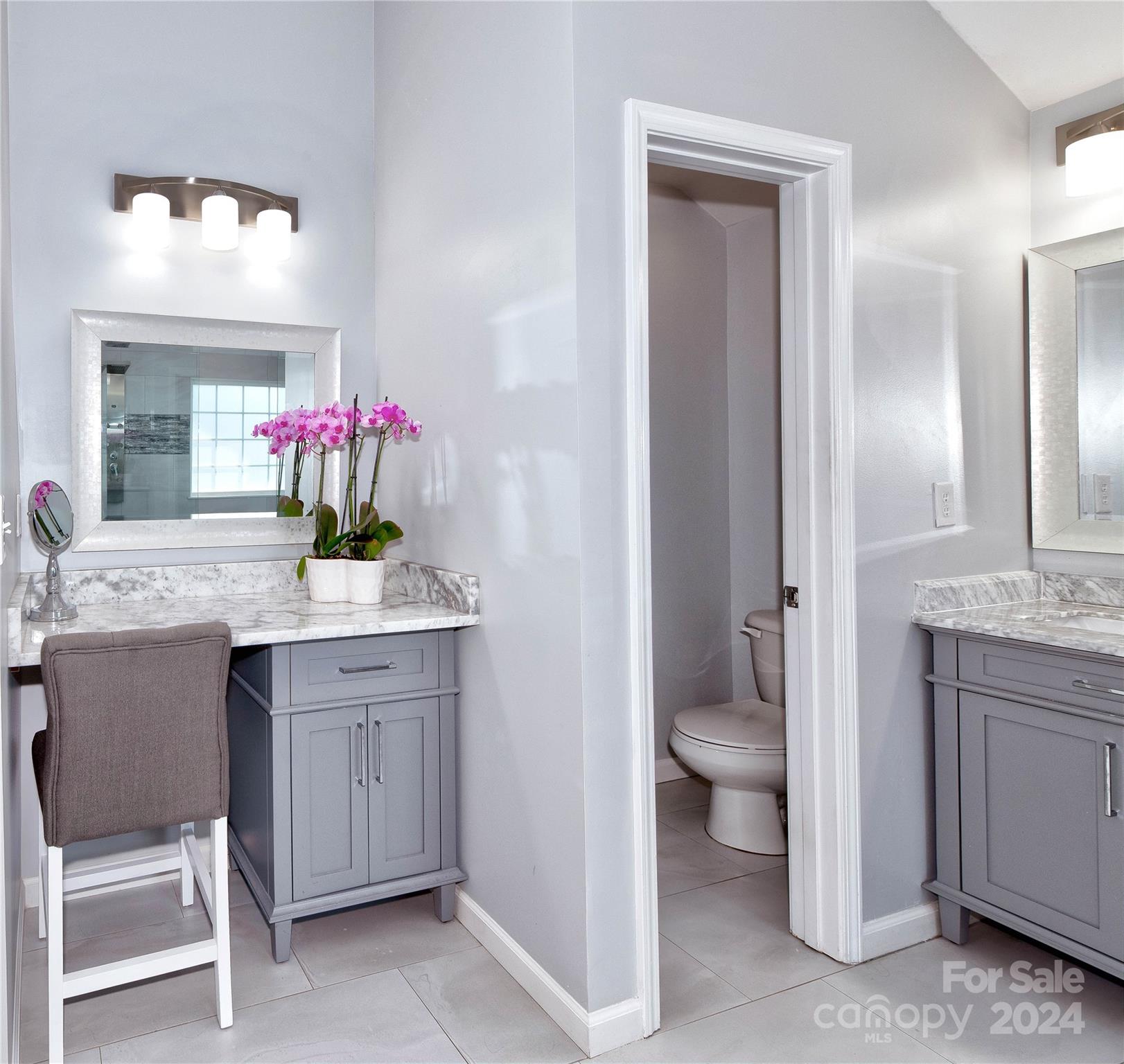 3002 Potomac Road Indian Trail, NC 28079 - Photo 30 of 48 a bathroom with a sink vanity and a mirror