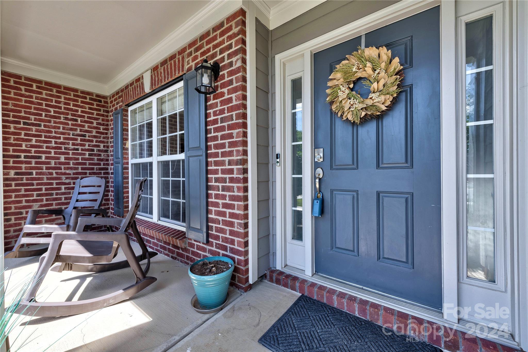 3002 Potomac Road Indian Trail, NC 28079 - Photo 3 of 48 a view of an entryway with wooden floor and a front door