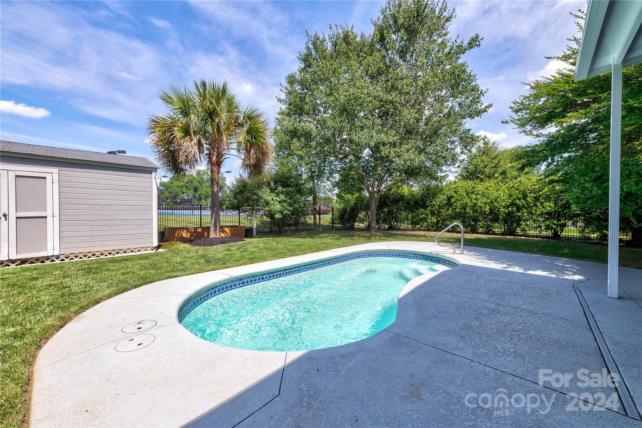 3002 Potomac Road Indian Trail, NC 28079 - Photo 43 of 48 a view of a swimming pool and red space