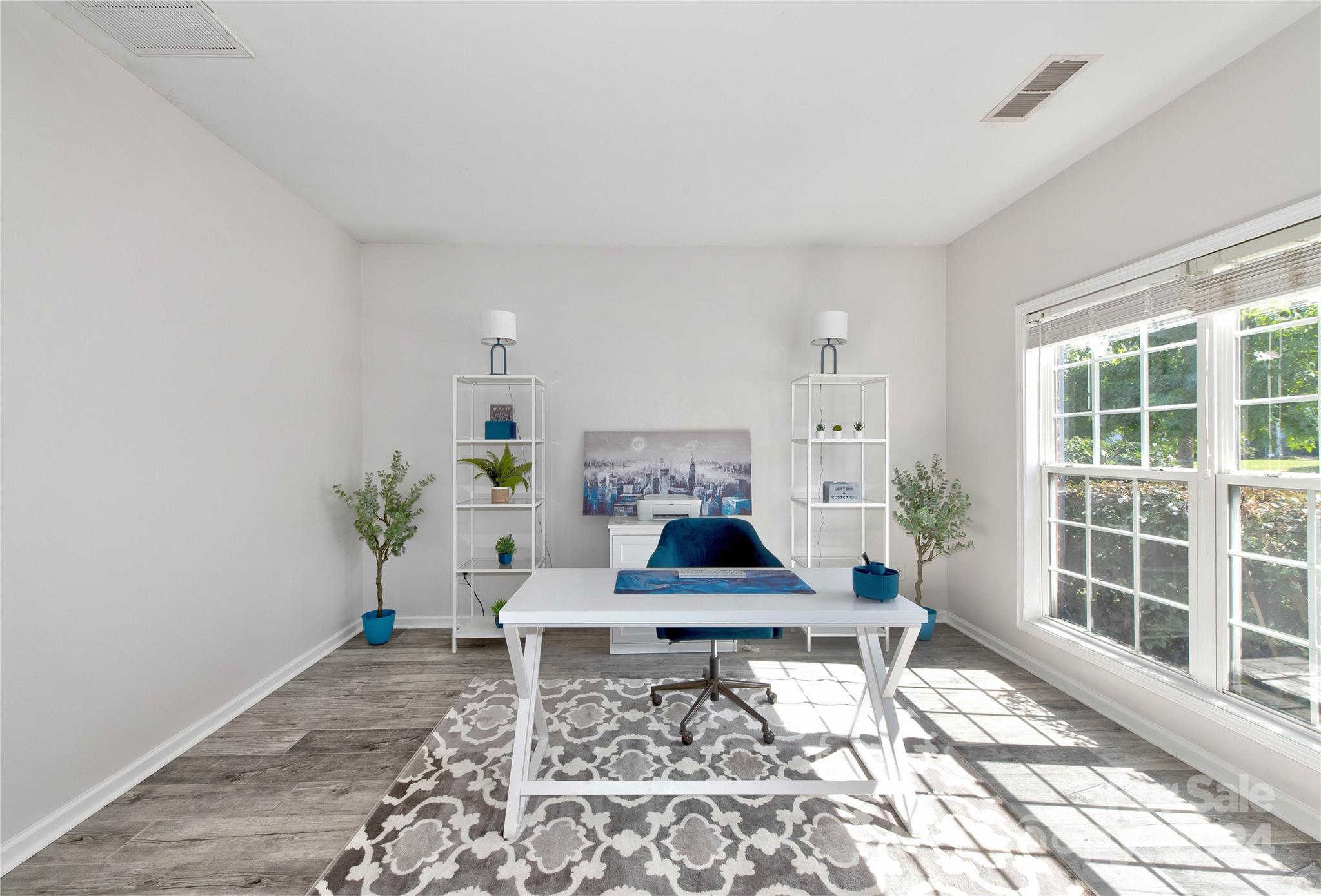 3002 Potomac Road Indian Trail, NC 28079 - Photo 5 of 48 a living room with furniture and a potted plant