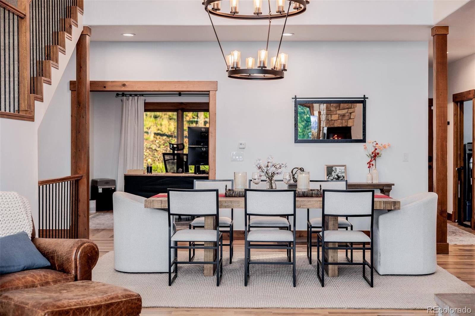 11272 Belle Meade Drive Conifer, CO 80433 - Photo 12 of 45 a view of a dining room with furniture