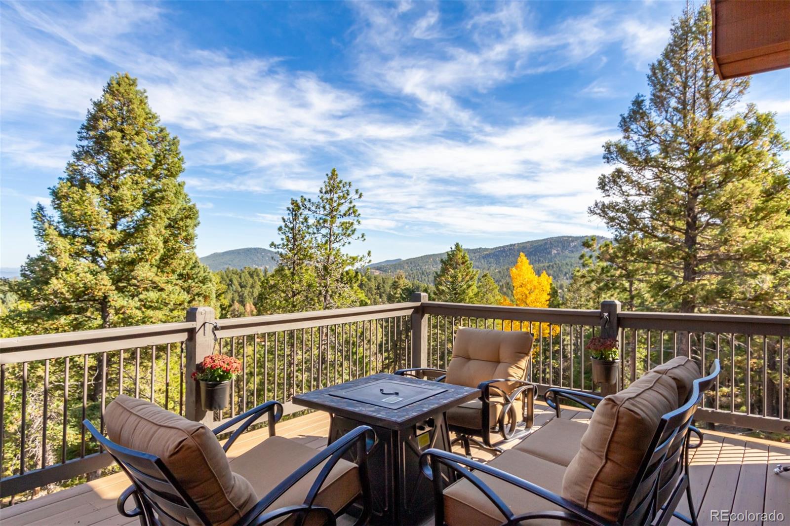 11272 Belle Meade Drive Conifer, CO 80433 - Photo 24 of 45 a view of a balcony with furniture