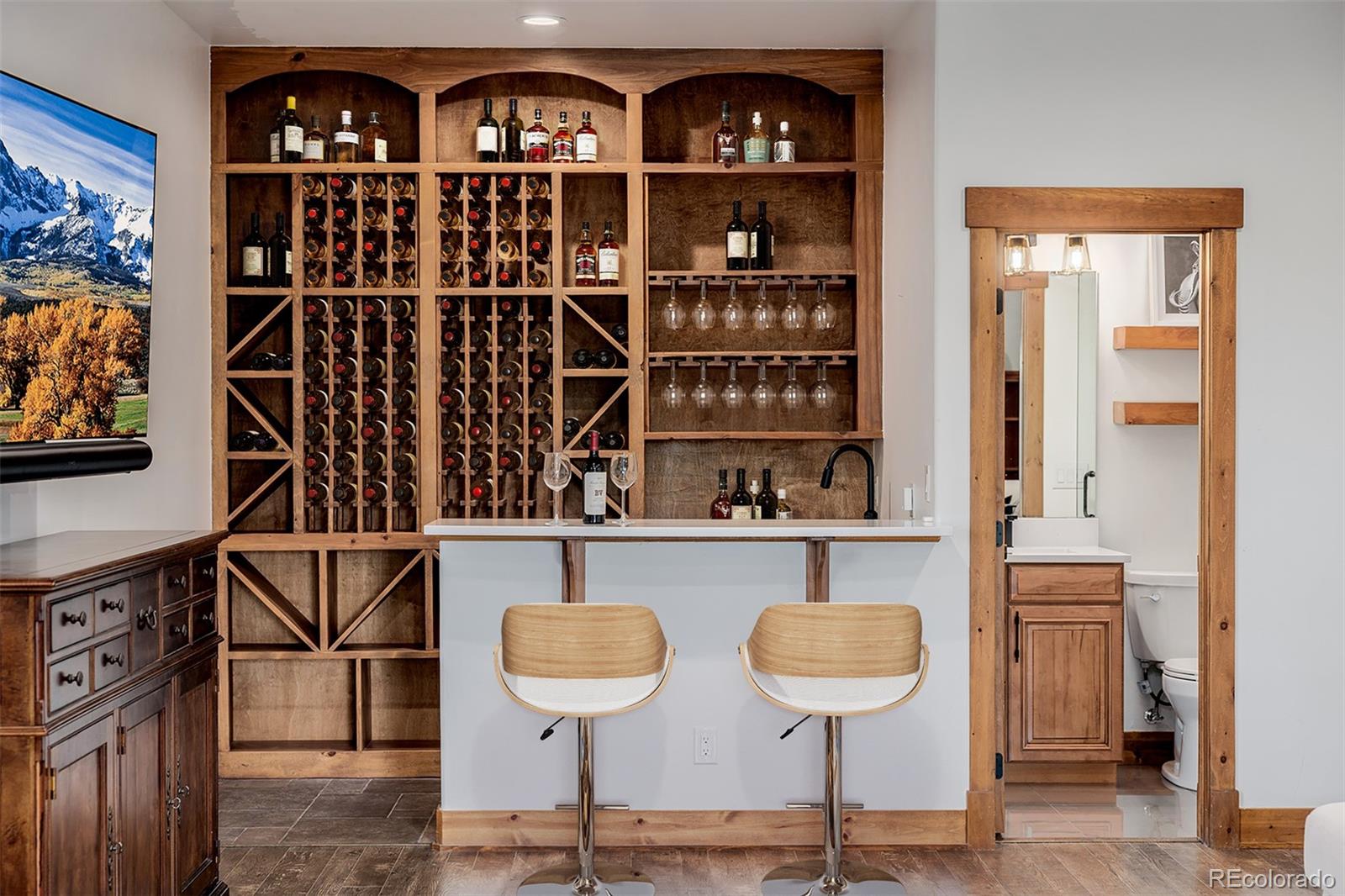 11272 Belle Meade Drive Conifer, CO 80433 - Photo 37 of 45 a view of a chairs and table in a room
