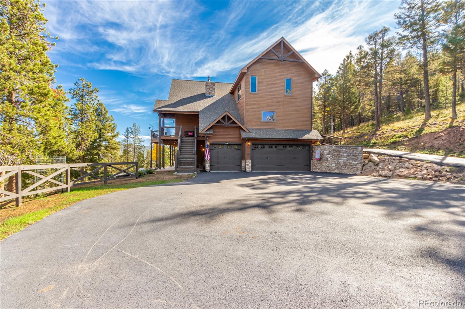 11272 Belle Meade Drive Conifer, CO 80433 - Photo 40 of 45 a view of a house with a outdoor space