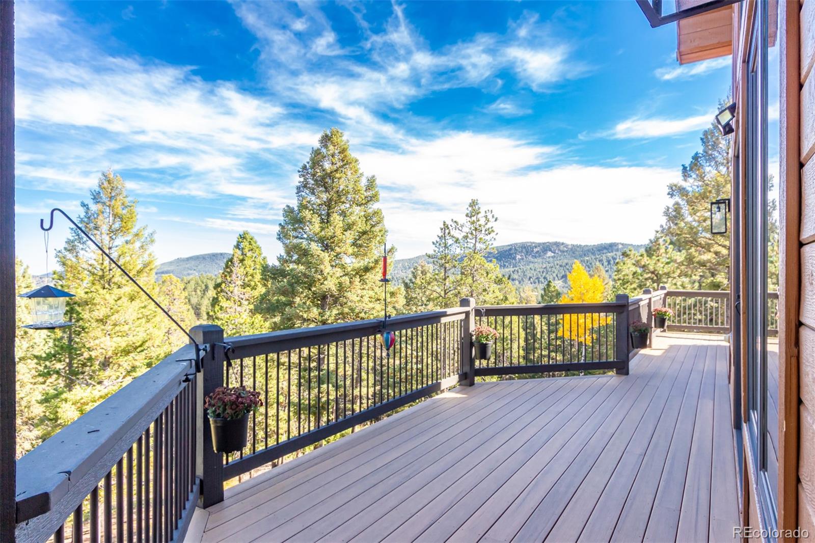 11272 Belle Meade Drive Conifer, CO 80433 - Photo 8 of 45 a view of city from a balcony