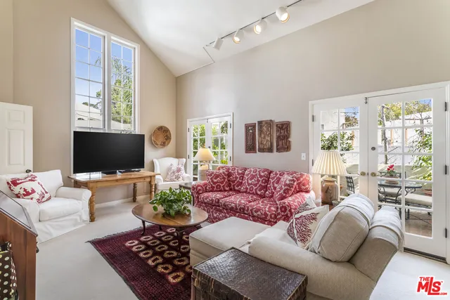 a living room with furniture or couch and a flat screen tv