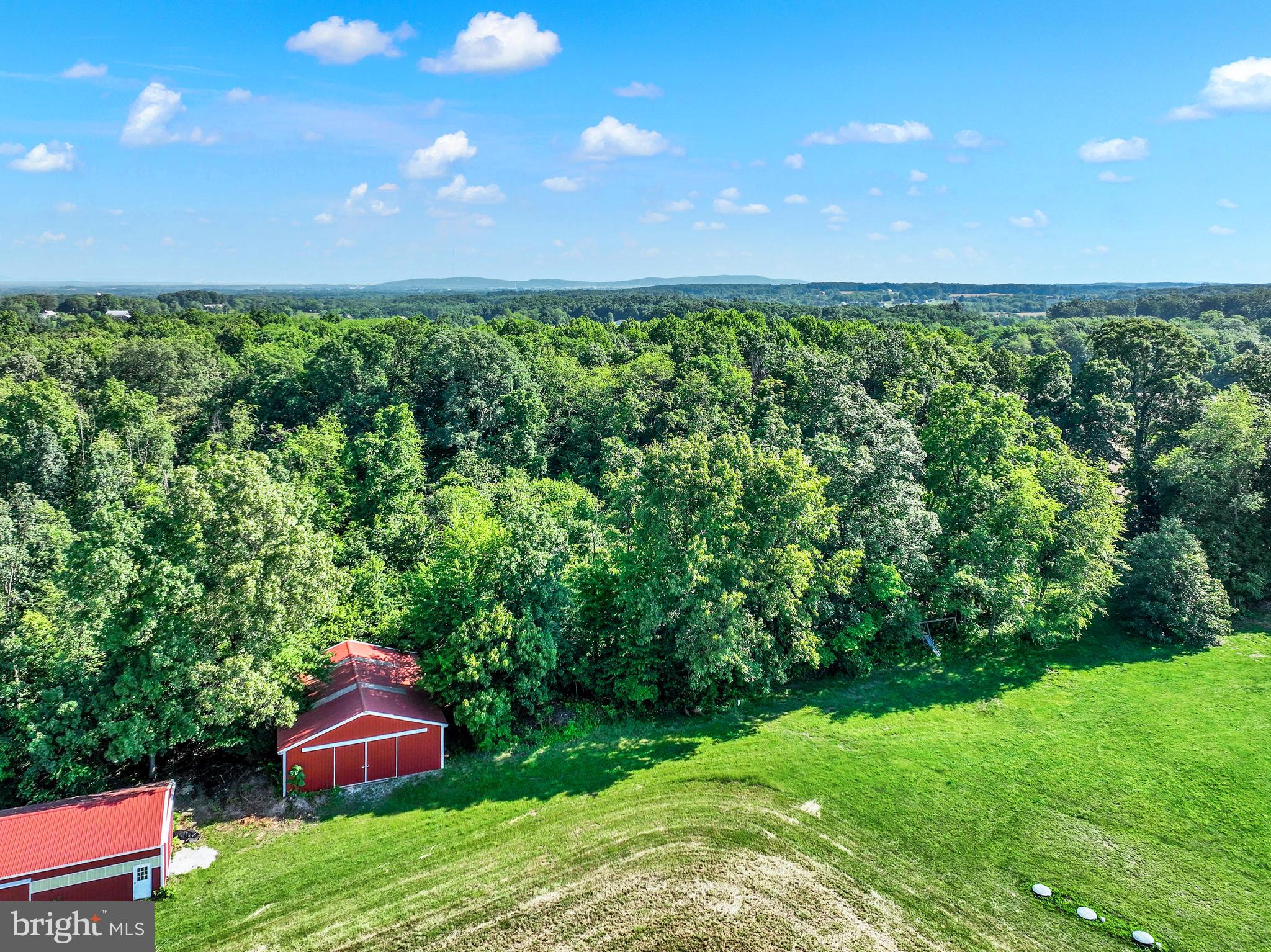 220 Clouser Road Hanover, PA 17331 - Photo 48 of 56 Aerial view of Pole barns and trees