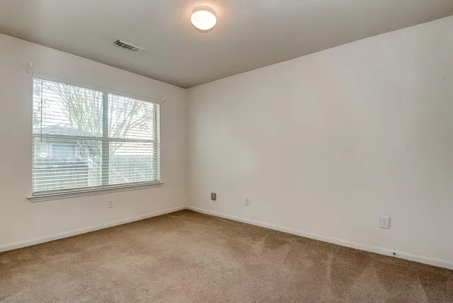 an empty room with a window