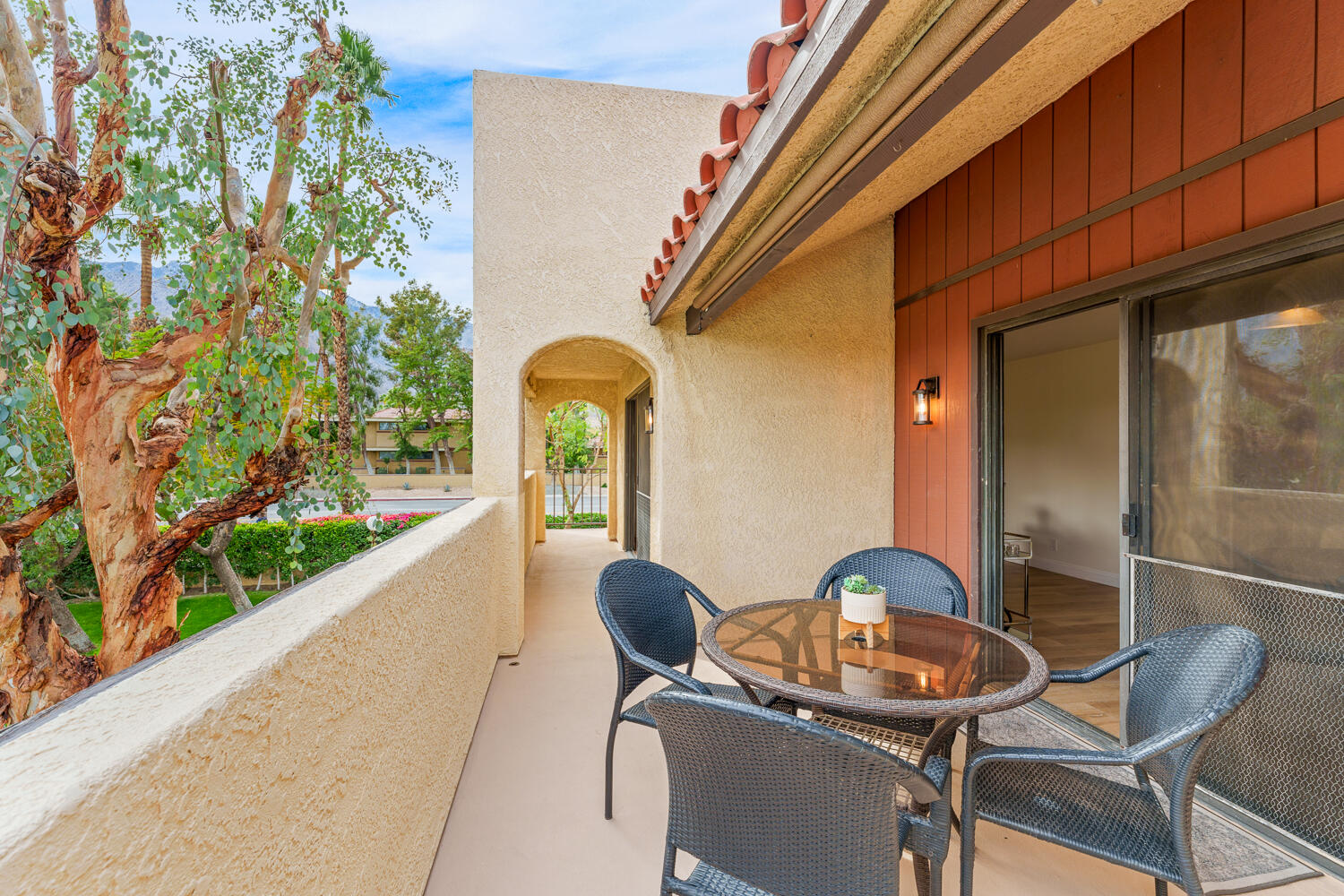 200 East Racquet Club Road, Unit 60 Palm Springs, CA 92262 - Photo 15 of 48 a outdoor space with chairs