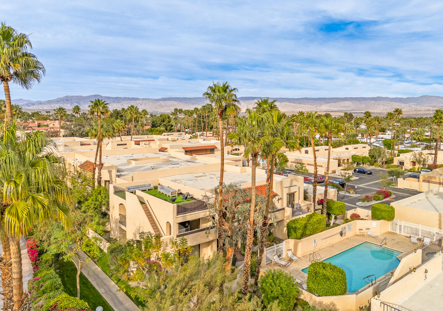 200 East Racquet Club Road, Unit 60 Palm Springs, CA 92262 - Photo 41 of 48 a view of a swimming pool with an ocean view