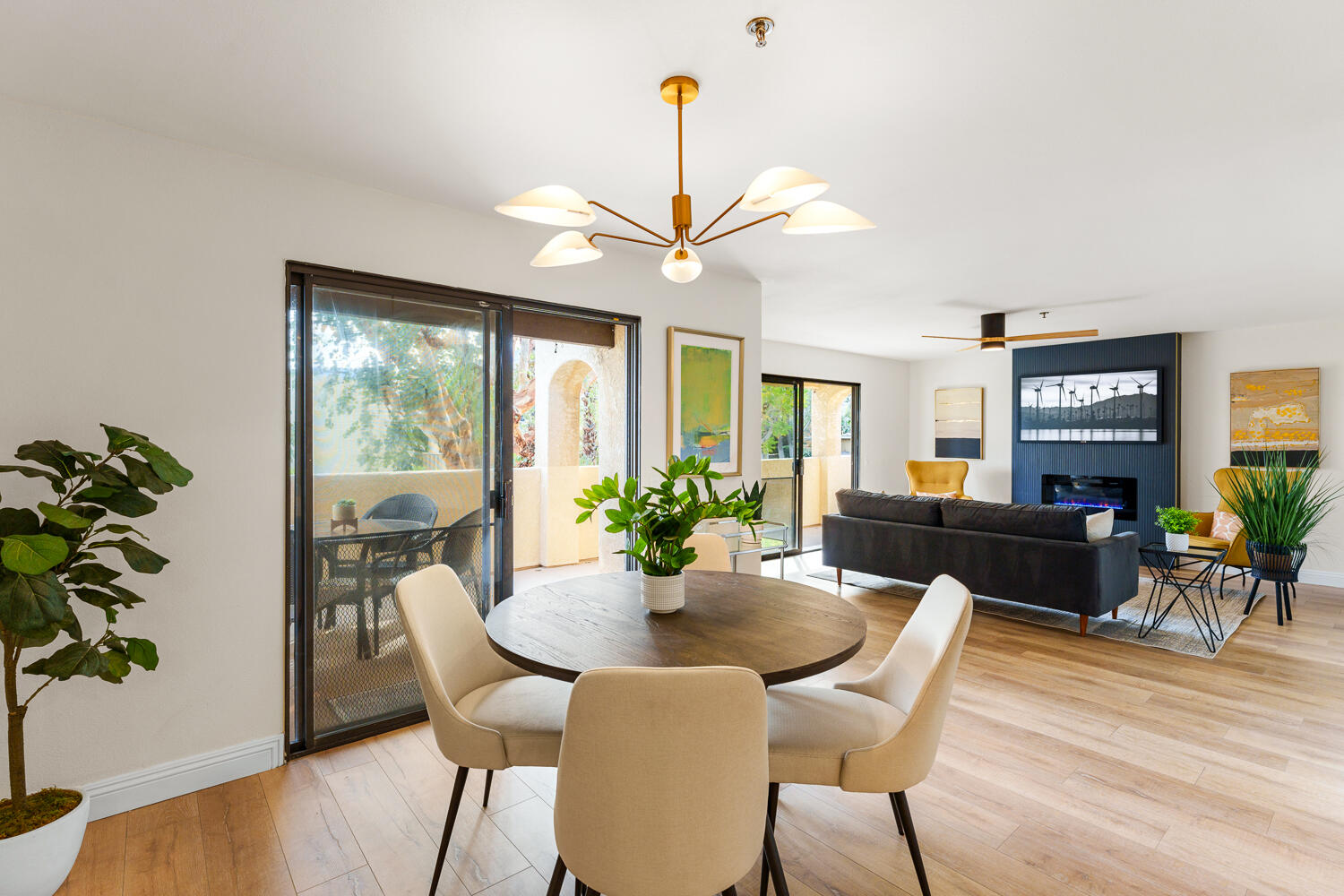200 East Racquet Club Road, Unit 60 Palm Springs, CA 92262 - Photo 7 of 48 a view of a dining room with furniture window and wooden floor