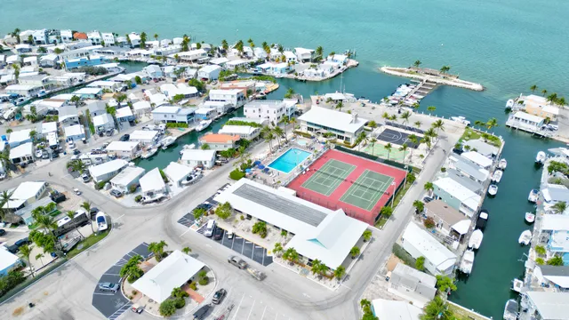 a bathroom with a sink vanity granite and a mirror