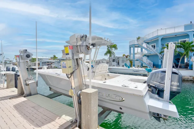 a house view with outdoor seating space and wooden floor