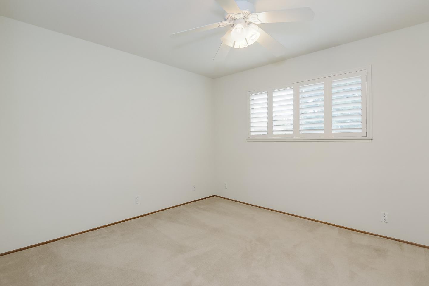 950 Boranda Avenue, Unit 10 Mountain View, CA 94040 - Photo 13 of 20 an empty room with a window