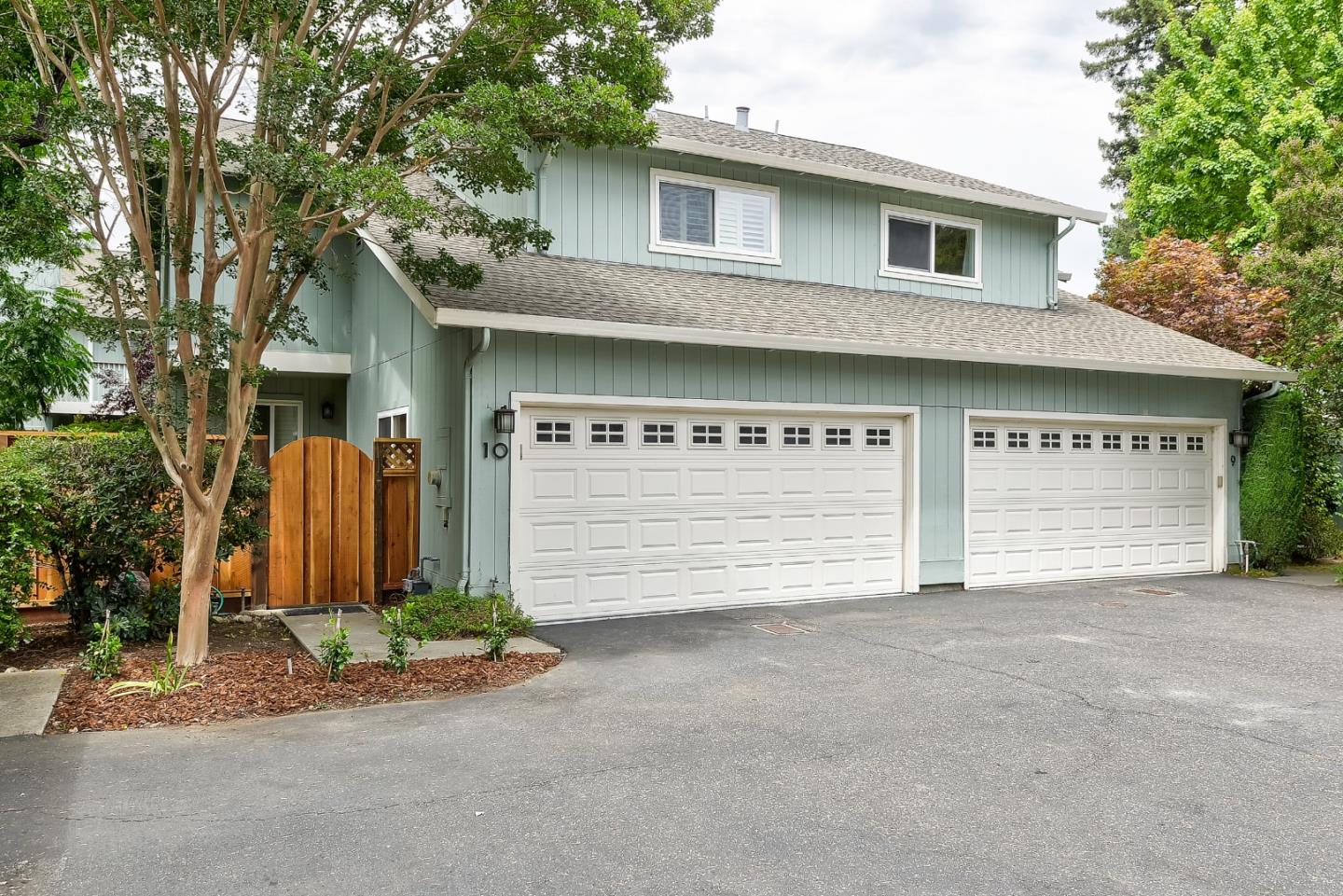 950 Boranda Avenue, Unit 10 Mountain View, CA 94040 - Photo 2 of 20 a front view of a house with a garage