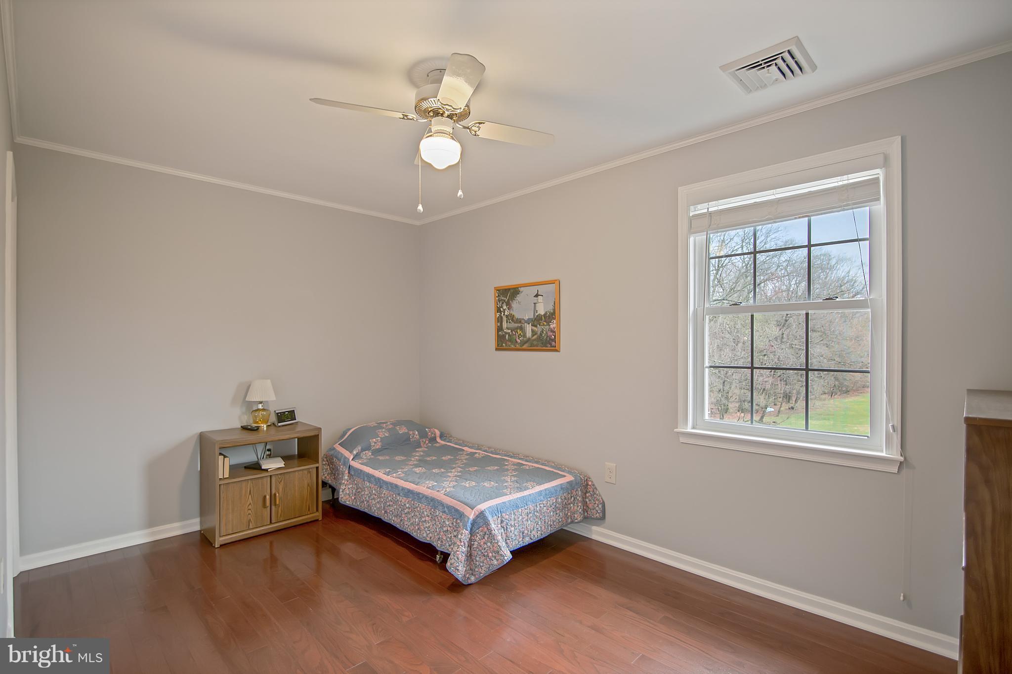 1772 Bloom Road Westminster, MD 21157 - Photo 13 of 30 a room with a bed and a window