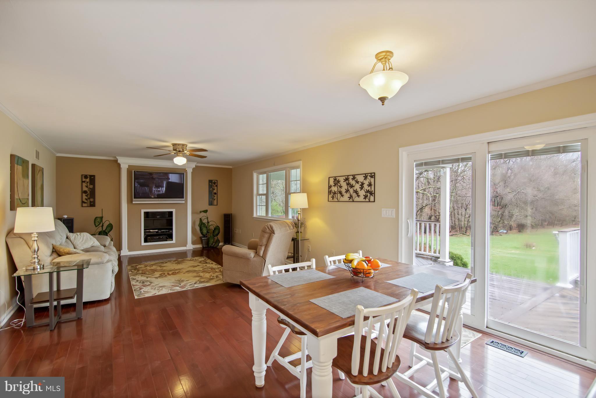 1772 Bloom Road Westminster, MD 21157 - Photo 17 of 30 a living room with fireplace furniture and a large window