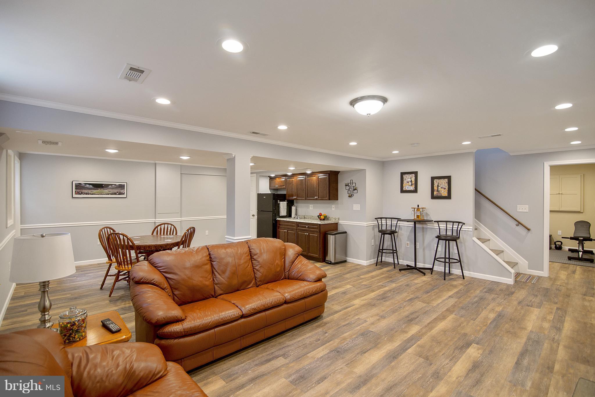 1772 Bloom Road Westminster, MD 21157 - Photo 20 of 30 a living room with furniture and a wooden floor