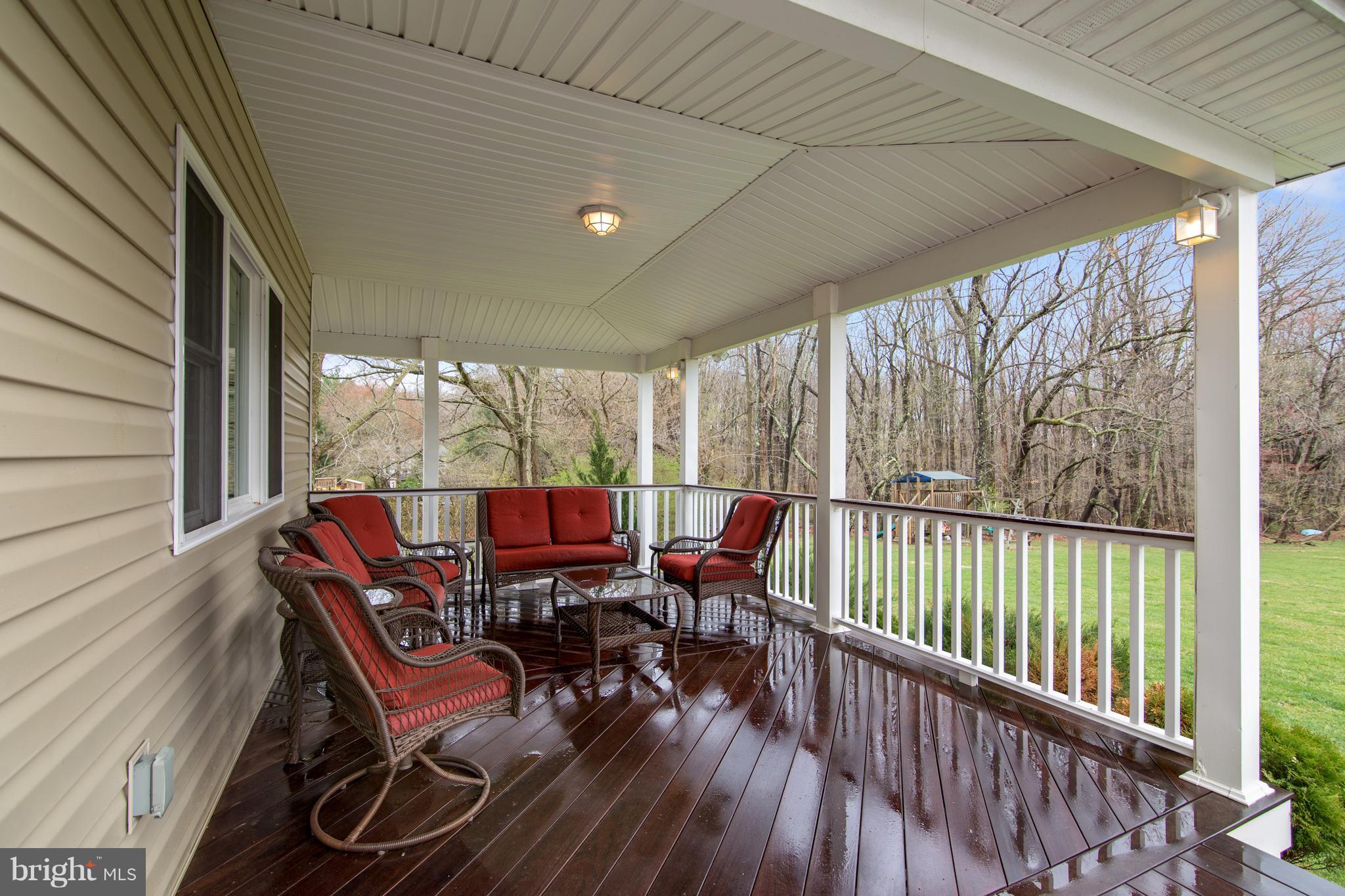 1772 Bloom Road Westminster, MD 21157 - Photo 27 of 30 a view of balcony with furniture and wooden deck