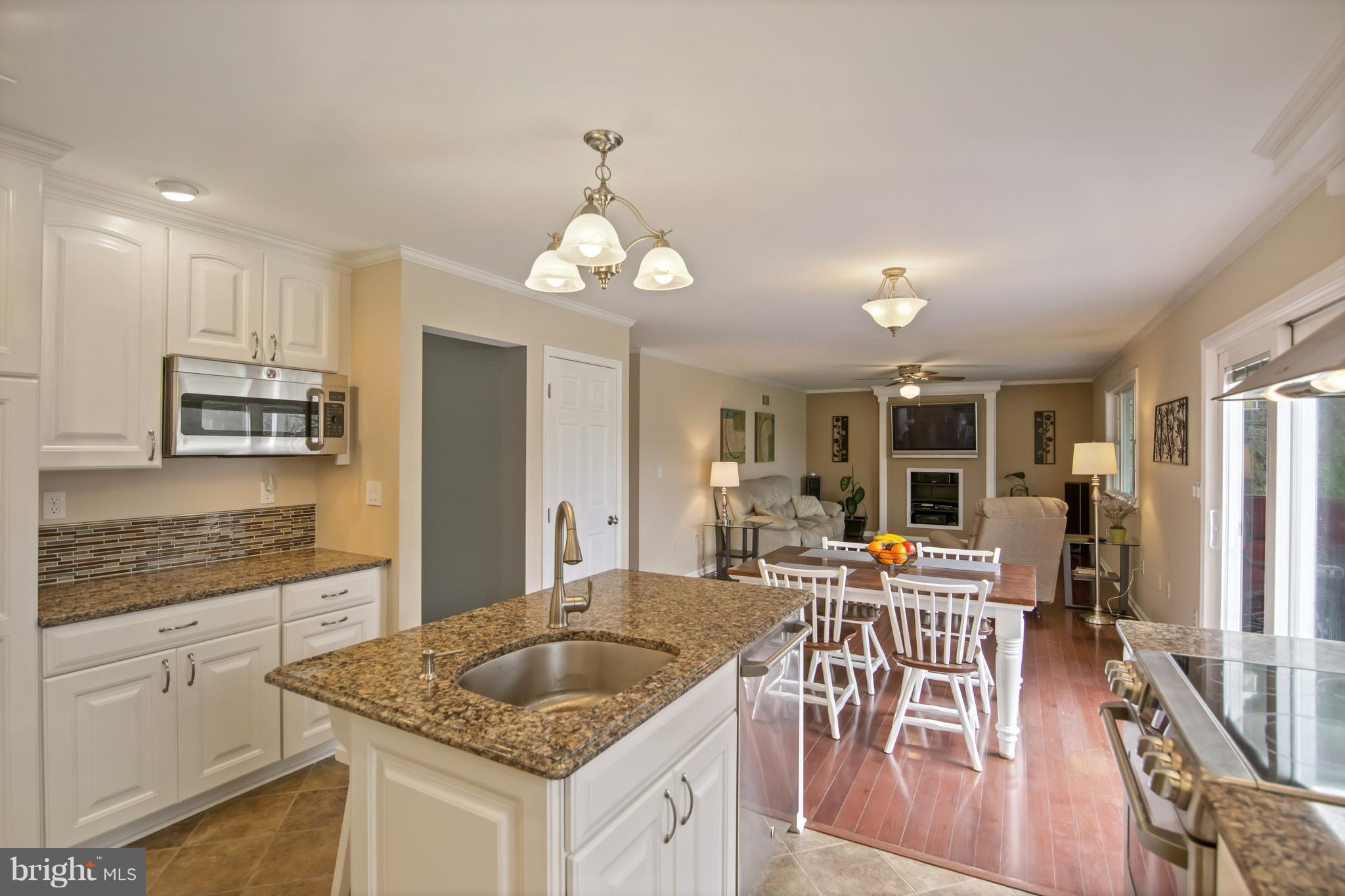 1772 Bloom Road Westminster, MD 21157 - Photo 5 of 30 a kitchen with stainless steel appliances granite countertop a sink stove and refrigerator