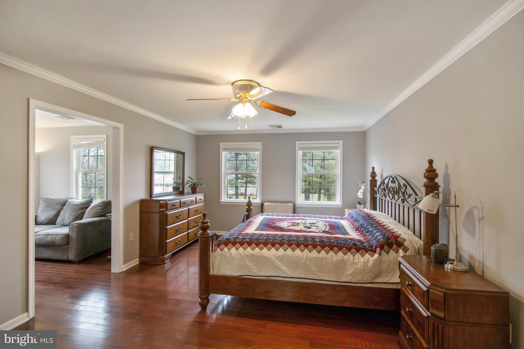 1772 Bloom Road Westminster, MD 21157 - Photo 8 of 30 a bedroom with a bed and wooden floor