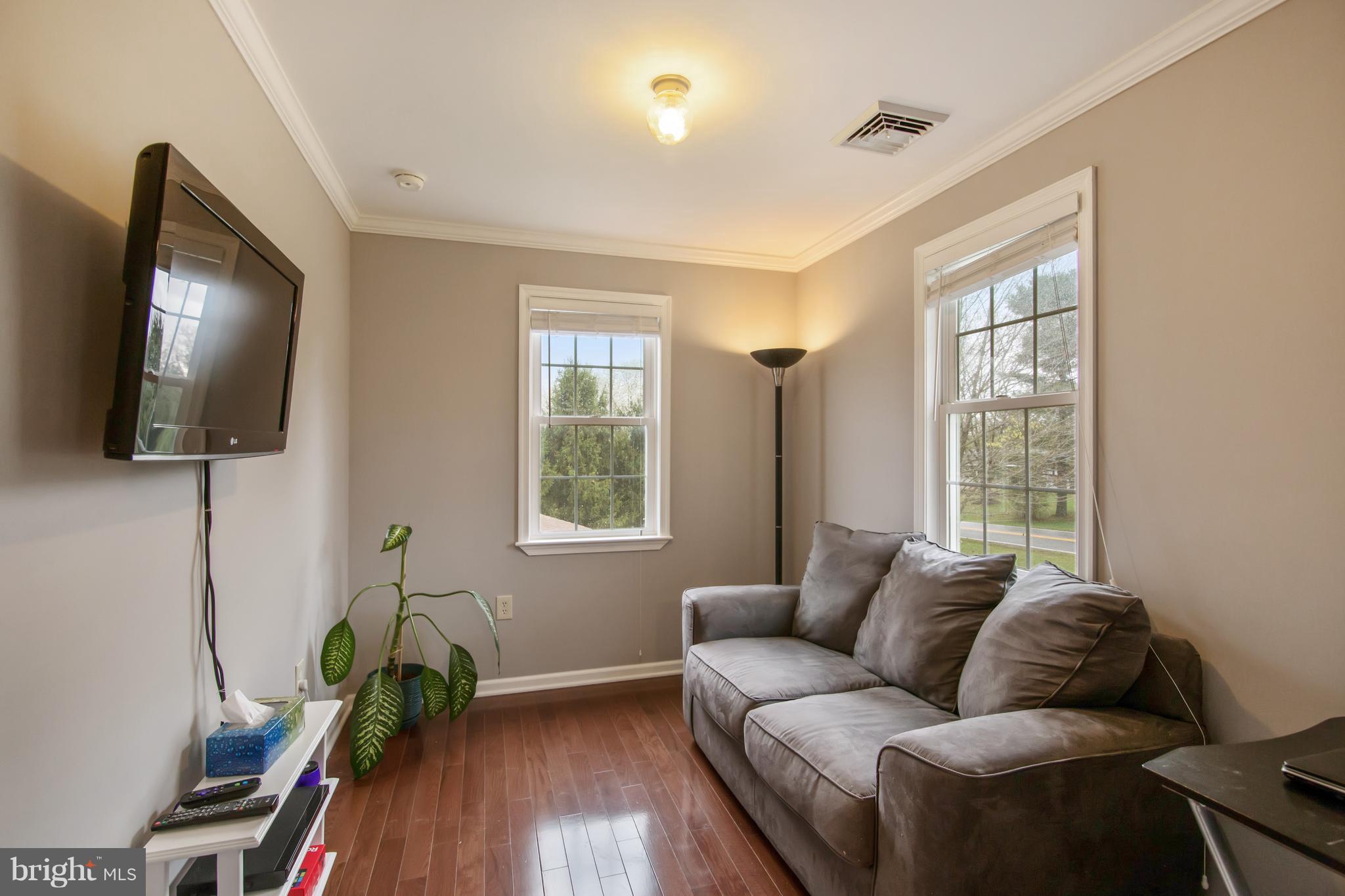 1772 Bloom Road Westminster, MD 21157 - Photo 9 of 30 a living room with furniture and a flat screen tv