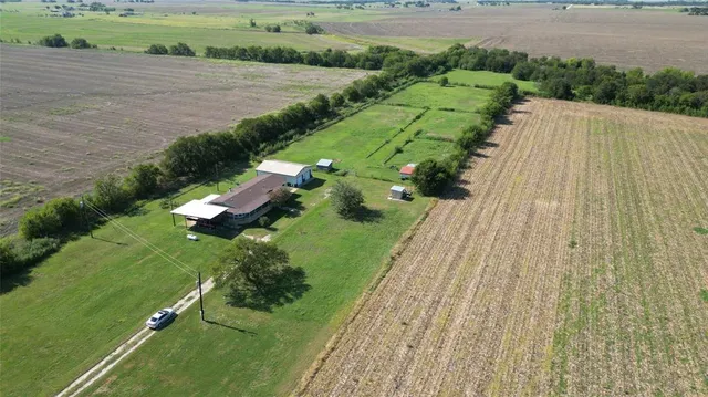 a view of a house with a big yard