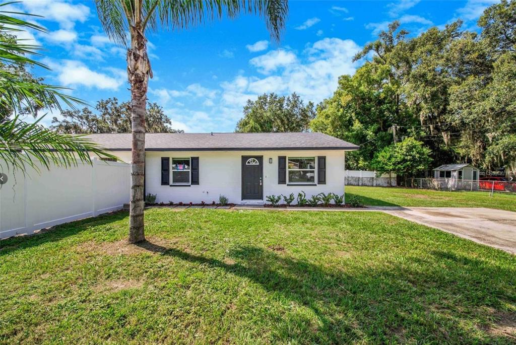 1102 Call Stewart Road Lakeland, FL 33811 - Photo 1 of 1 a view of a house with a backyard