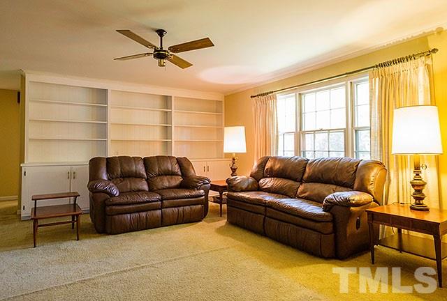 2709 Baptist Road Durham, NC 27703 - Photo 15 of 25 a living room with furniture and a window