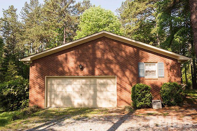 2709 Baptist Road Durham, NC 27703 - Photo 20 of 25 a view of a house with a tree