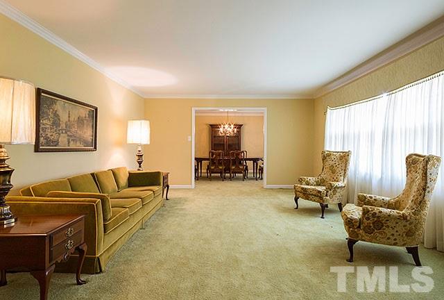 2709 Baptist Road Durham, NC 27703 - Photo 3 of 25 a living room with furniture and a large window