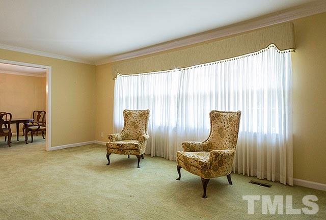 2709 Baptist Road Durham, NC 27703 - Photo 5 of 25 a living room with furniture and a window