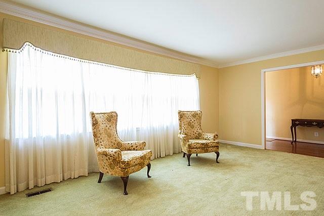 2709 Baptist Road Durham, NC 27703 - Photo 6 of 25 a living room with furniture and floor to ceiling window