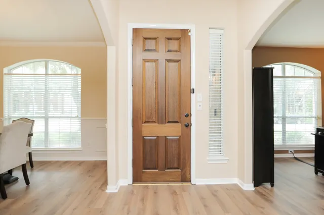 wooden floor and windows in a room