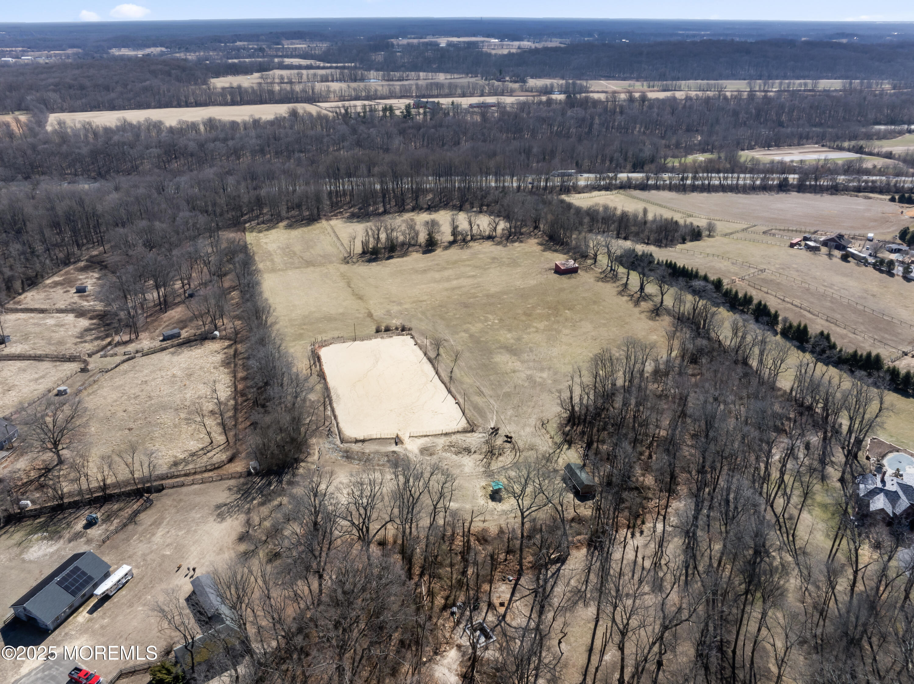 35 Rues Road Cream Ridge, NJ 08514 - Photo 21 of 46 an aerial view of a house with a yard and lake view