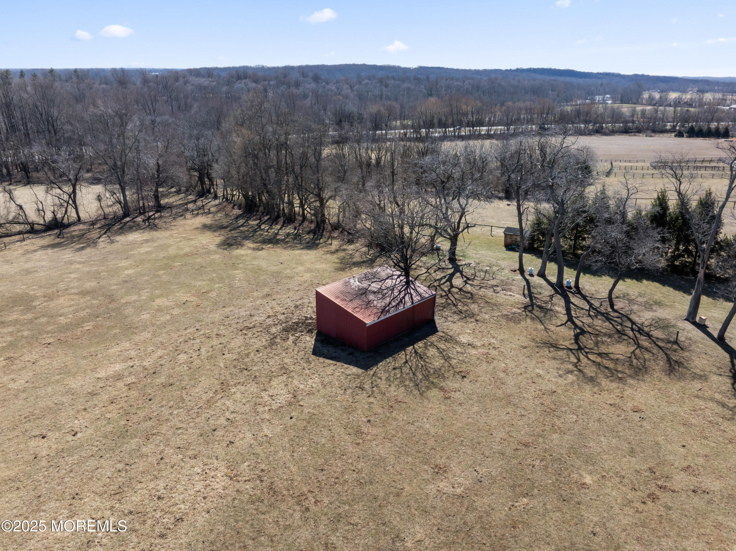 35 Rues Road Cream Ridge, NJ 08514 - Photo 22 of 46 a view of a backyard with table and chairs